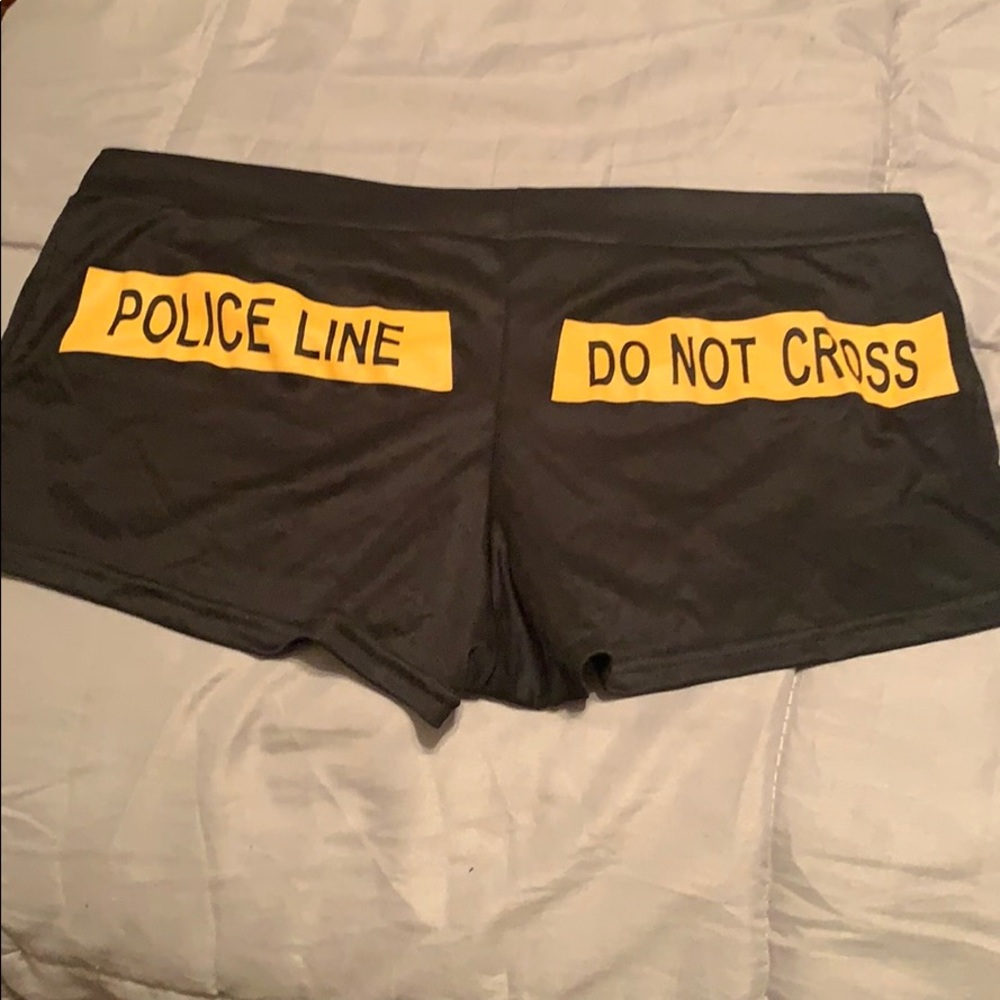 “Police line do not cross” spanks